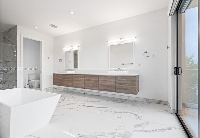 Building Photo - 16529 Botaniko Dr N