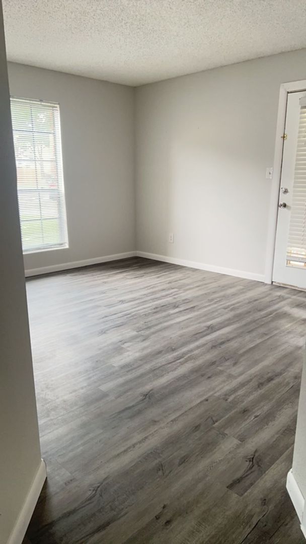 Building Photo - For Rent: 1 Bedroom, 1 Bath in a gated com...