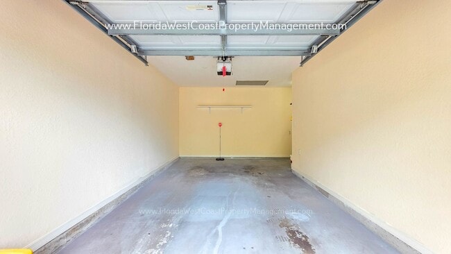 Building Photo - MOVE IN READY! LARGE 2 BEDROOM/2 BATH PLUS ATTACHED GARAGE! TILE/LVP THROUGHOUT!