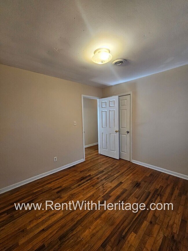 Building Photo - Great Brick Ranch / Harwood Floors / Huge Shop or Extra Storage / No Garage / Great Private Back ...