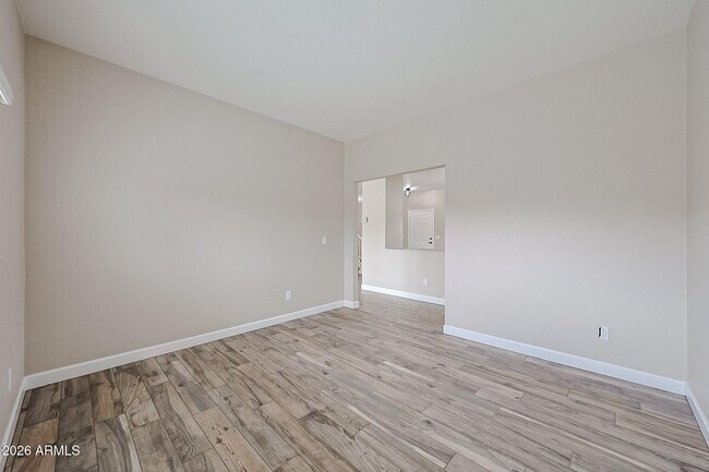 Building Photo - 15569 W Gelding Dr