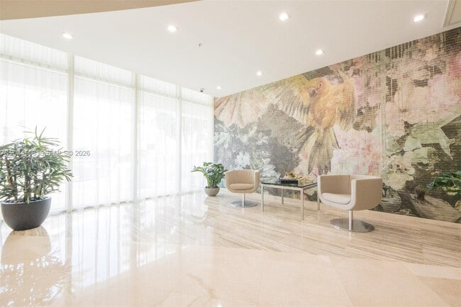 Building Photo - 10275 Collins Ave