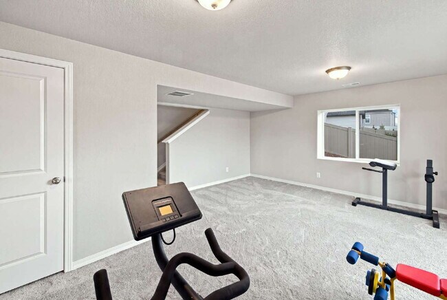 Building Photo - Beautiful 2025-Built 5 Bedroom Home with Finished Walk-Out Basement