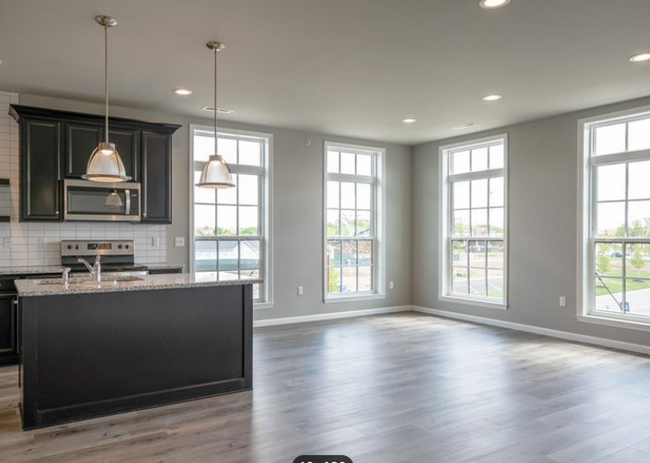 Kitchen and dining area - 301 Tillary Ln