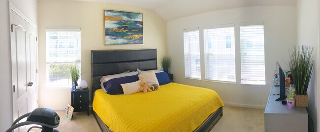 Primary bedroom with two closets (including a walk-in, as currently furnished) - 9714 Pine Arcade