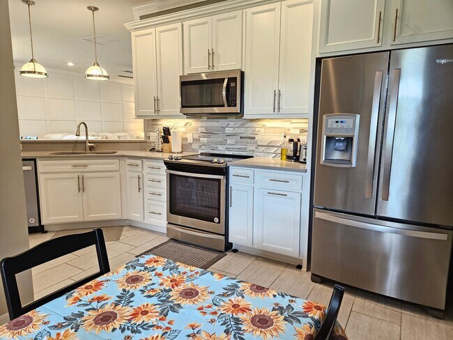 Building Photo - Stunning Model Home – 2 Bedrooms plus Den,...
