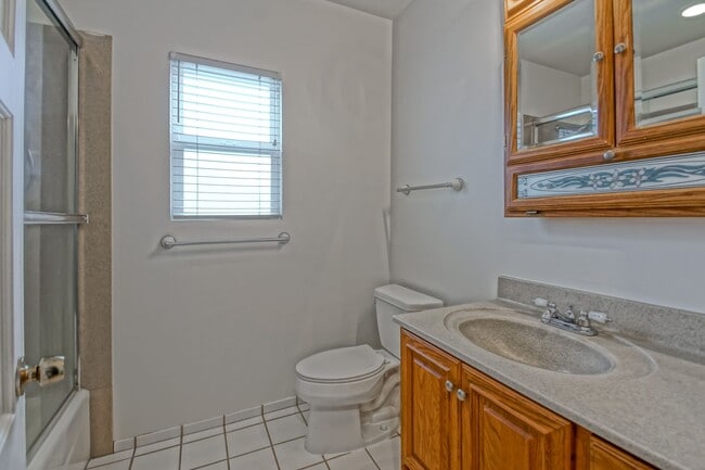 Building Photo - Bright & Charming, Single Story 3BR2BA Home w/ Large Front Yard, Huge Fenced Rear Yard w/ Large D...