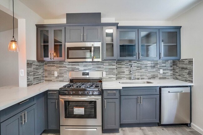 Building Photo - 6430 8th Ave