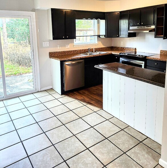 New slider off kitchen - 2519 beech st