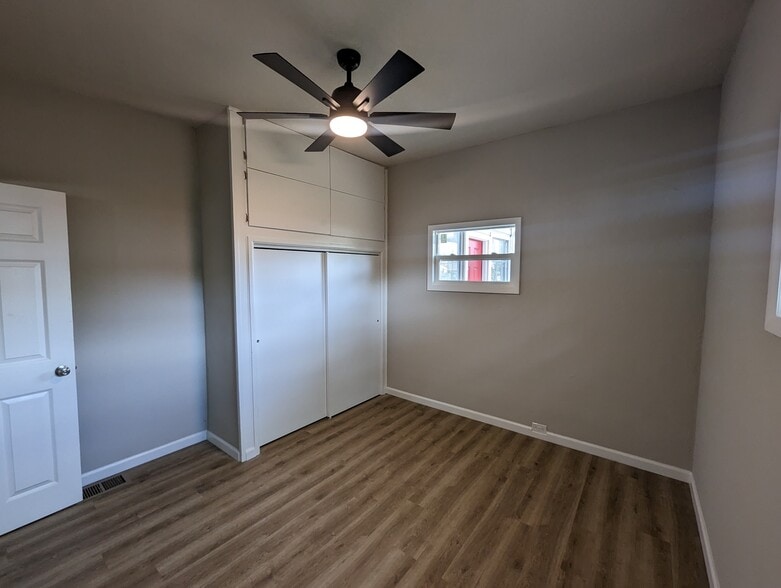 Bedroom 1 with extra storage above closet - 2608 19th Ave W