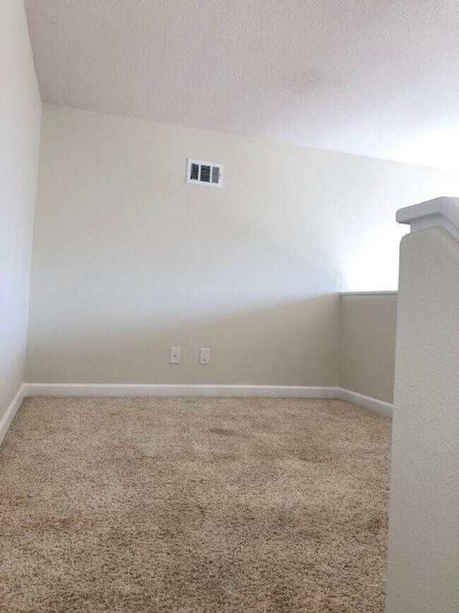 Building Photo - PICTURE PERFECT 2 BR/2 BATH PLUS LOFT END UNIT CONDO WITH DIRECT ACCESS 2 CAR GARAGE