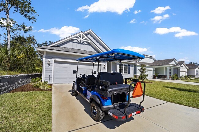 Building Photo - "Luxurious Furnished Home with 4-Bed, 3-Bath, Swim Spa Fenced Yard Golf Cart steps to the beach!"