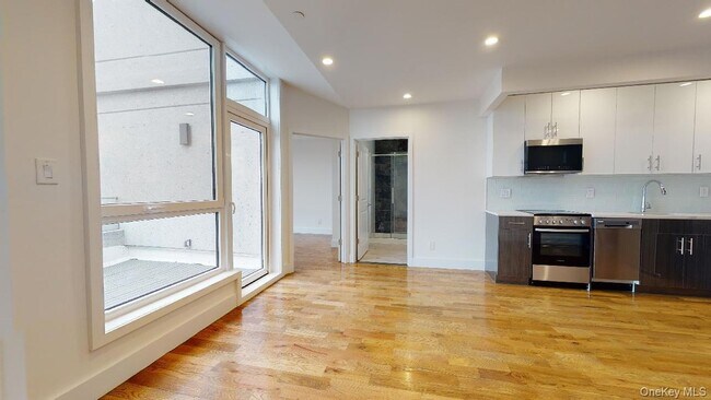Building Photo - 138-28 Queens Blvd
