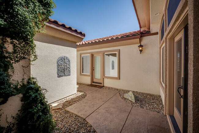 Private courtyard with separate entrance to secondary bedrooms for guests convenience. - 2850 Bronzino Ct