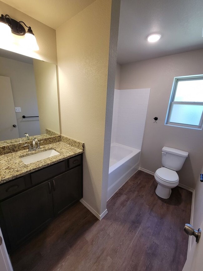 Building Photo - Bryan -3 bedroom / 2 bath / 2 car garage / Large fenced in back yard.