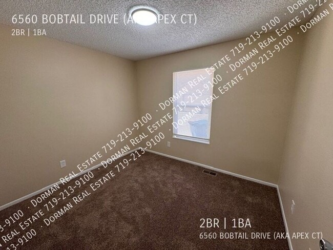 Building Photo - 6560 Bobtail Dr
