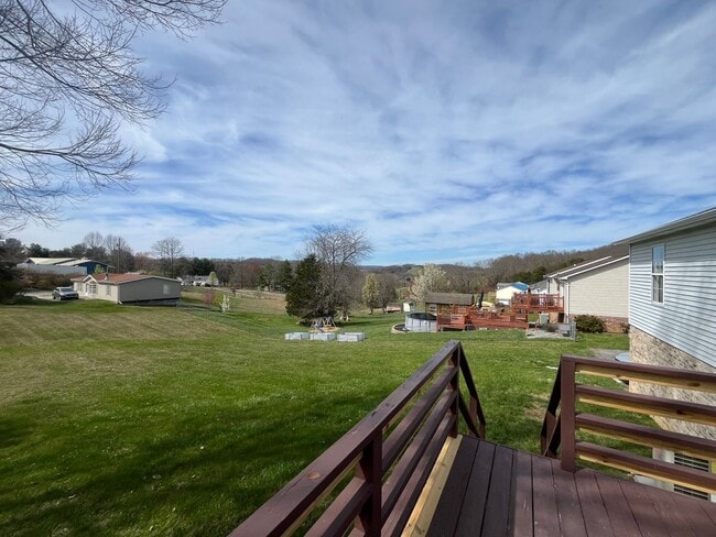 Building Photo - Split foyer 3 bedroom home in quiet area with bonus room, large yard, 2-car garage $2000