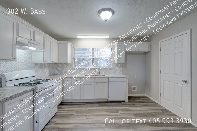 Building Photo - 302 W. Bass-