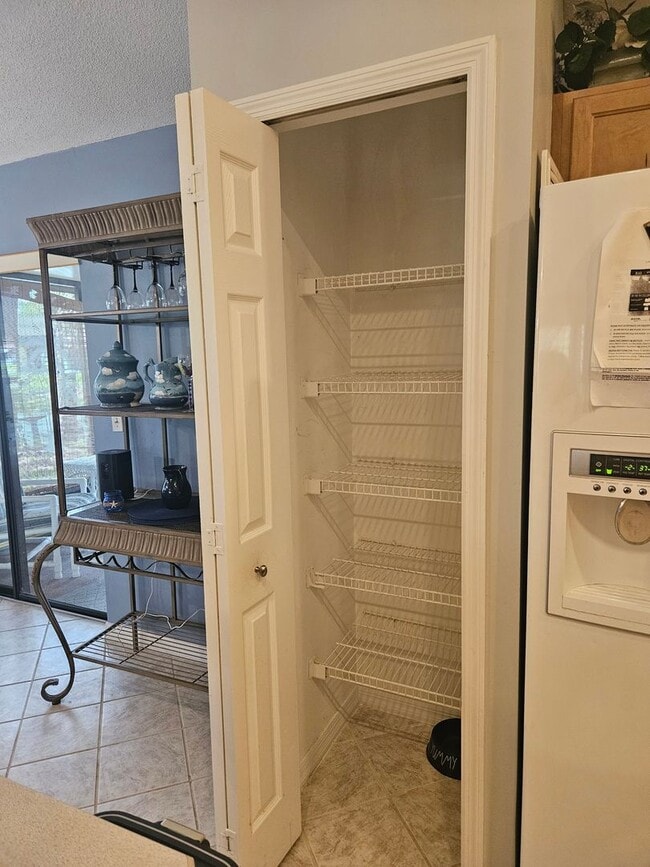 Building Photo - 2 BEDROOM 2 BATH HOME IN  PELICAN BAY GATED COMMUNITY