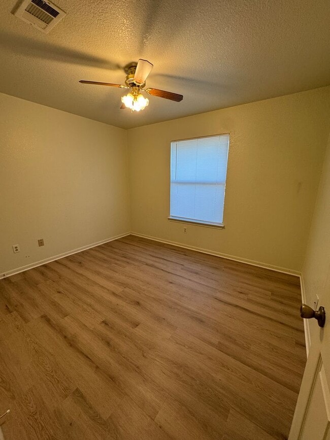 Building Photo - Charming 3-bedroom, 2-bath home offering peaceful country living on just under an acre.