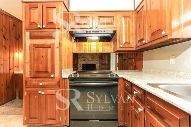 Building Photo - Lease today! No extra charge for contentme...