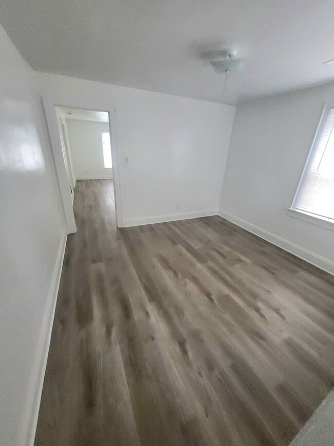 Building Photo - Large 2 BDRM 1 BA single family home across from the Beach!