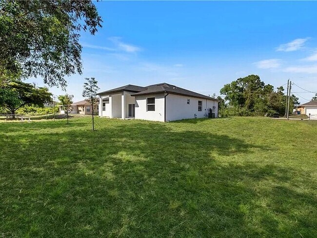 Building Photo - Charming 3BR House in Lehigh Acres