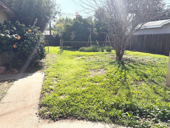 Building Photo - Spacious 3-Bedroom Home with Bonus Room, Bright Sunroom & Large Backyard