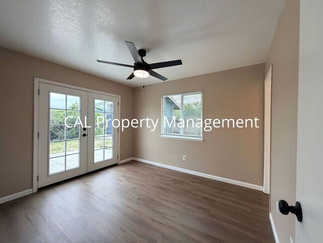 Building Photo - Spacious 4-Bedroom Home with 2-Car Garage & Backyard Oasis