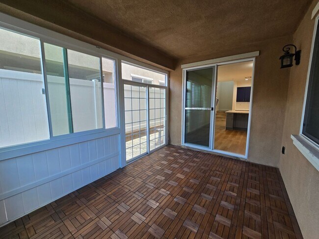 Building Photo - Open-Concept Living with Downstairs Bedroom & Enclosed Patio Retreat