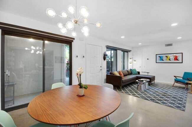 Building Photo - Stylish Ground-Floor Condo in Gated Palm S...