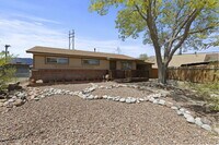 Building Photo - Updated 2 Bed + Bonus Workshop | Huge Backyard | Two Storage Sheds | Carport | Pet Friendly