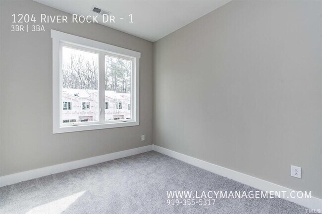 Building Photo - 1204 River Rock Dr