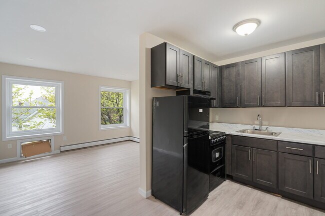 Building Photo - Railroad Manor - Nearly Renovated - Studio, 1 & 2 Bedroom apartments