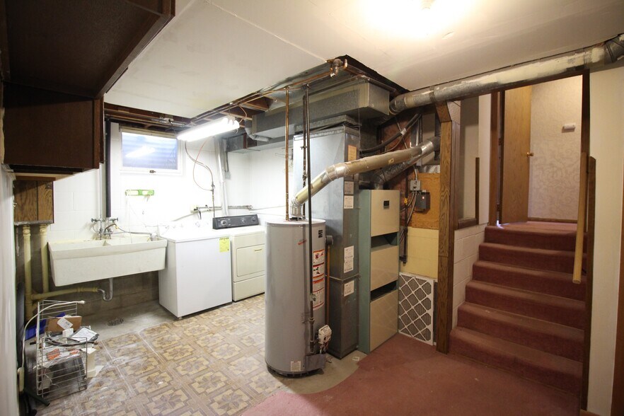 Utility room in the basement. - 9901 Blaisdell Ave S