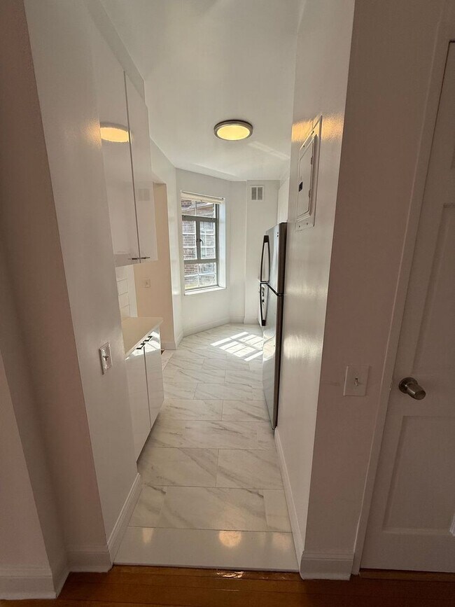 Building Photo - The Leslie — A Private Garden Enclave for the Modern New Yorker