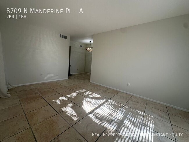 Building Photo - 8709 N Mandarine Pl