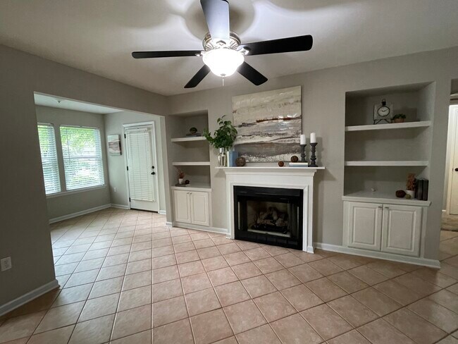 Great Room with ventless gas fireplace and built-in shelving - 1312 Hillbrow Ln