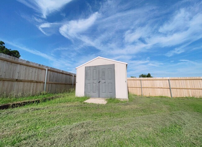 Building Photo - Fenced yard/Storage building/Close to coll...