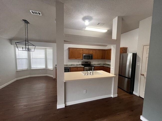 Building Photo - NEW IN MANAGEMENT - AVAILABLE NOW