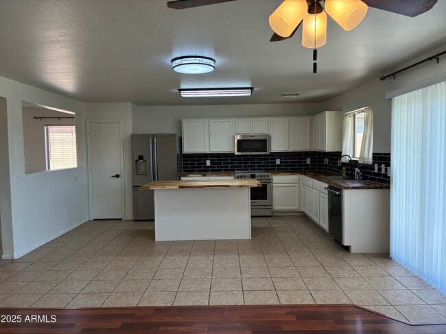 Building Photo - 7287 S Sunrise Way