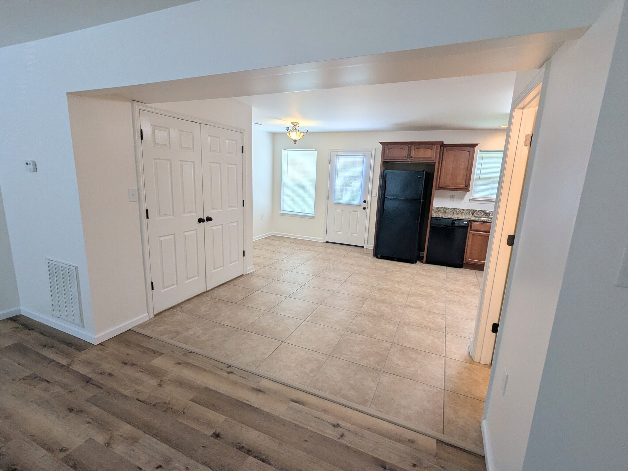 Laundry closet, dining area, kitchen - 2237 Spring Meadow Ln SE
