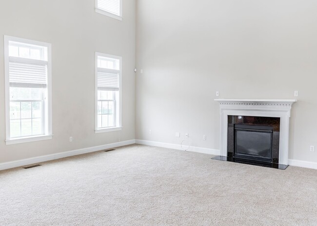 Building Photo - Huge house with vaulted ceilings and fenced in rear yard