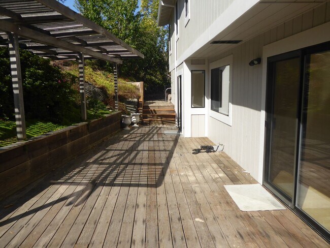Building Photo - SPACIOUS FOUR BEDROOM / THREE AND HALF BAT...