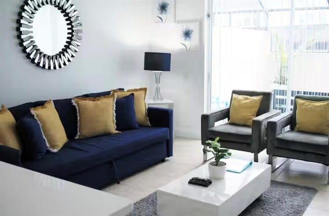 Building Photo - 8117 Princess Palm Ln