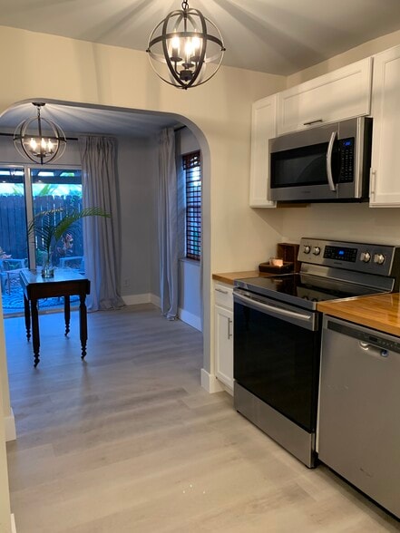Kitchen to Dining Room - 1202 N Andrews Ave