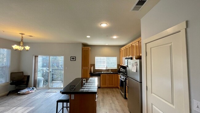 Building Photo - Sherwood Corner 3 Bed 2.5 Bath Townhome on top floor~  Reserved Parking and Washer & Dryer and Co...