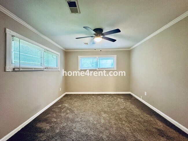 Building Photo - Lovely Three Bedroom Home in KCMO and an Updated Kitchen  w/ Granite and SS Appliances, including...