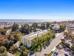 Building Photo - Available now! Updated Versailles Condo in Newport Beach