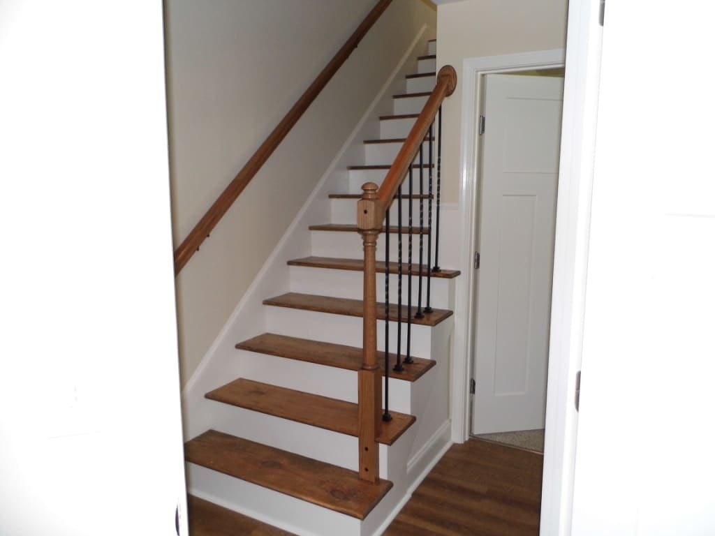 Craftsmen like details in the beautiful staircase with wrought iron rails - 2312-A Belle Ave NE